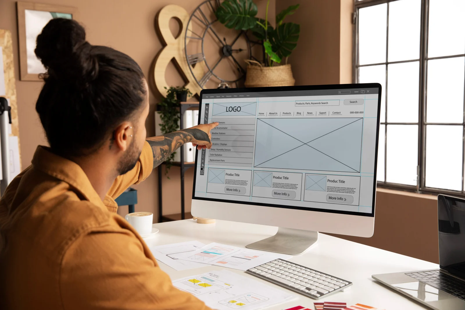 man-working-desk-medium-shot-scaled